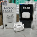 AirPods Pro 2 with packaging and charging case on a table